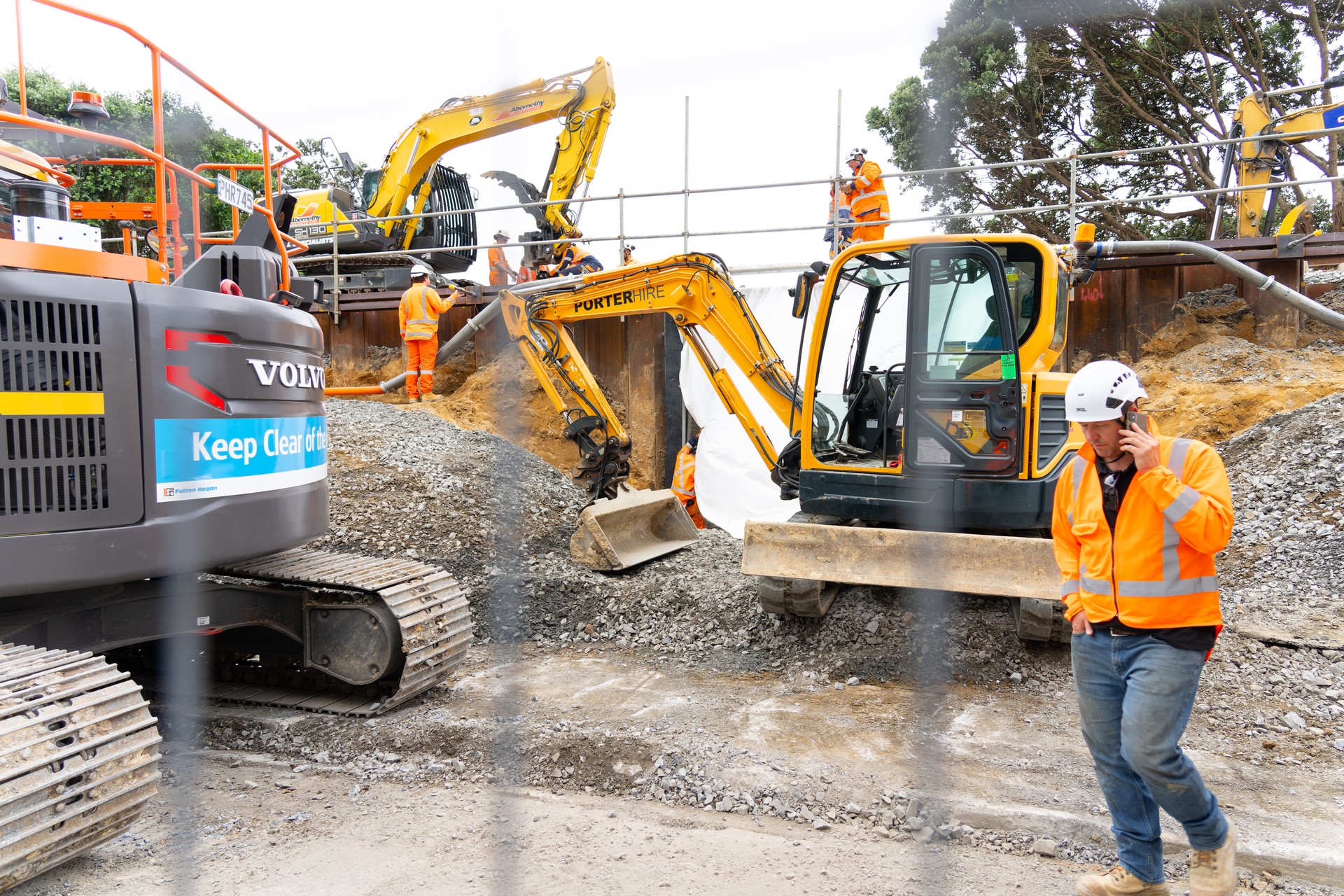 Heavy earthmoving machinery and specialist railway workers